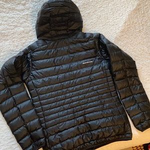 Cotopaxi Black “Fuego” puff with rose gold zipper